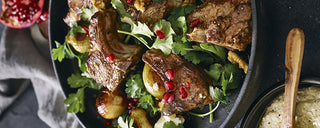 Slow Roasted Goat with Marinated Cheese and Pomegranate